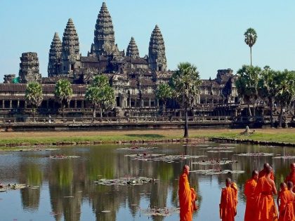 Buddhist monks in front of the Angkor Wat 3