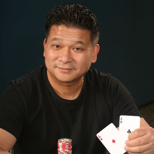 Johnny Chan with a pair of aces