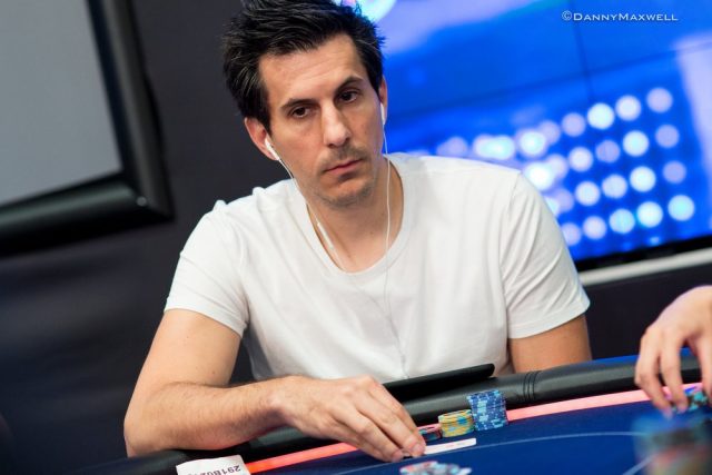 Haralabos Voulgaris playing poker wearing earphones