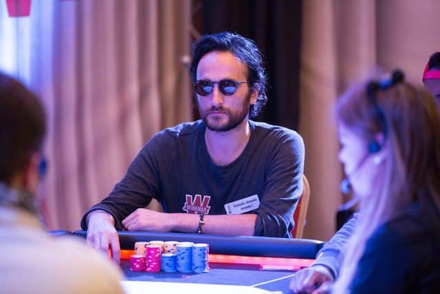 Davidi Kitai with sunglasses at the poker table